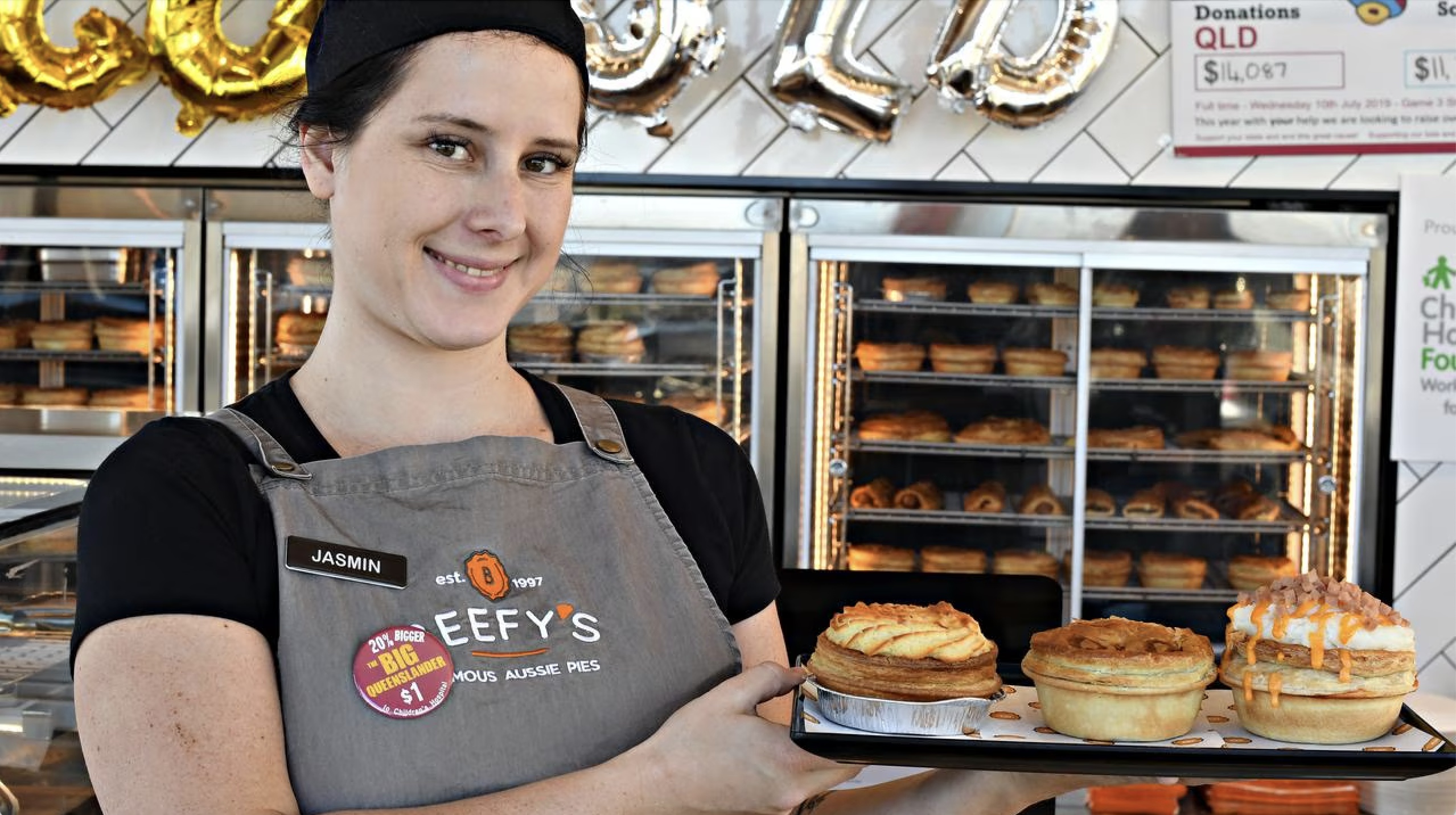 Jasmin at the Beefy’s Pies counter with a tray of fresh pies