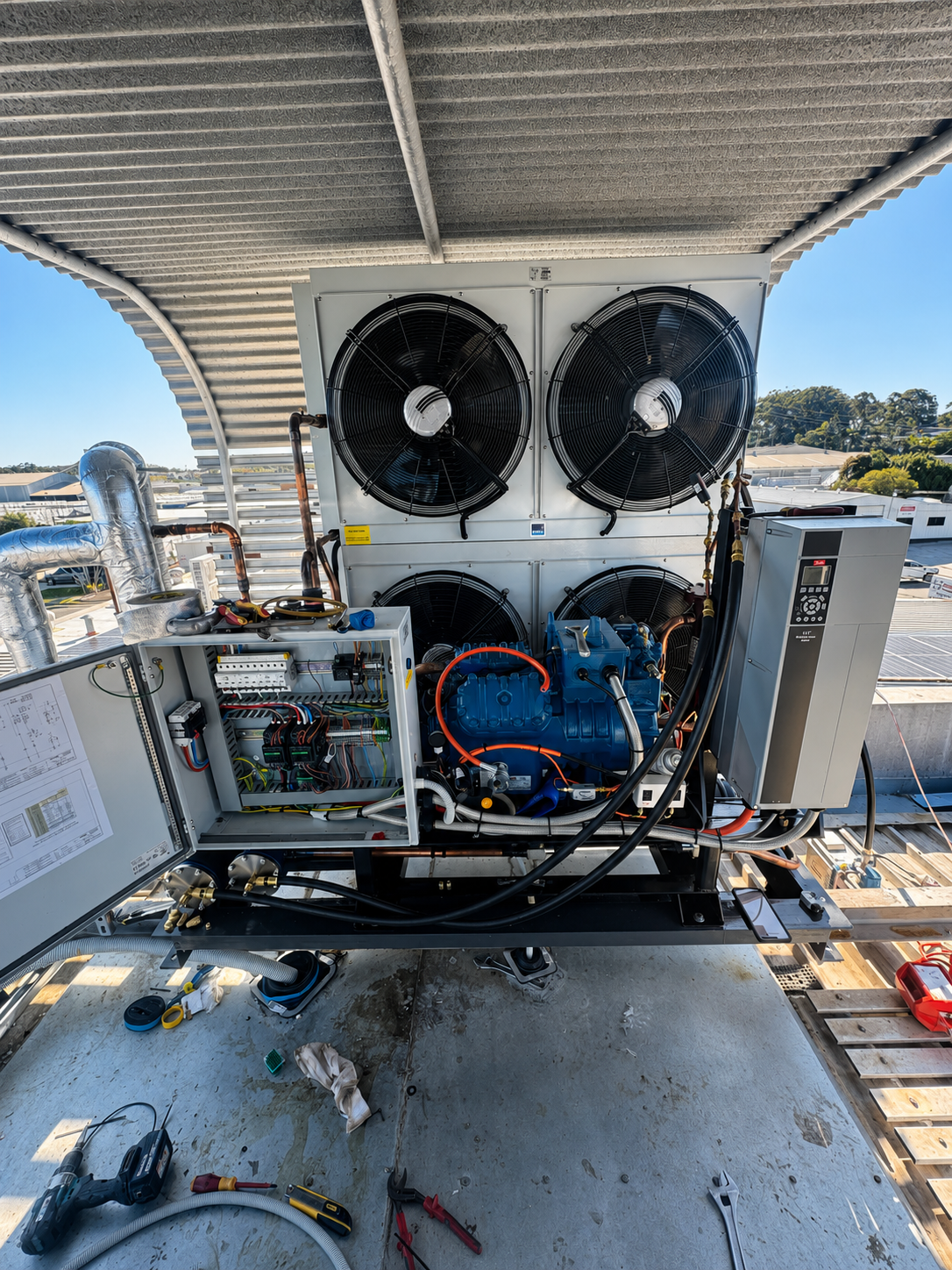 A commercial refrigeration condensing unit with EC fans and Danfoss variable speed drive installed by SETPOINT
