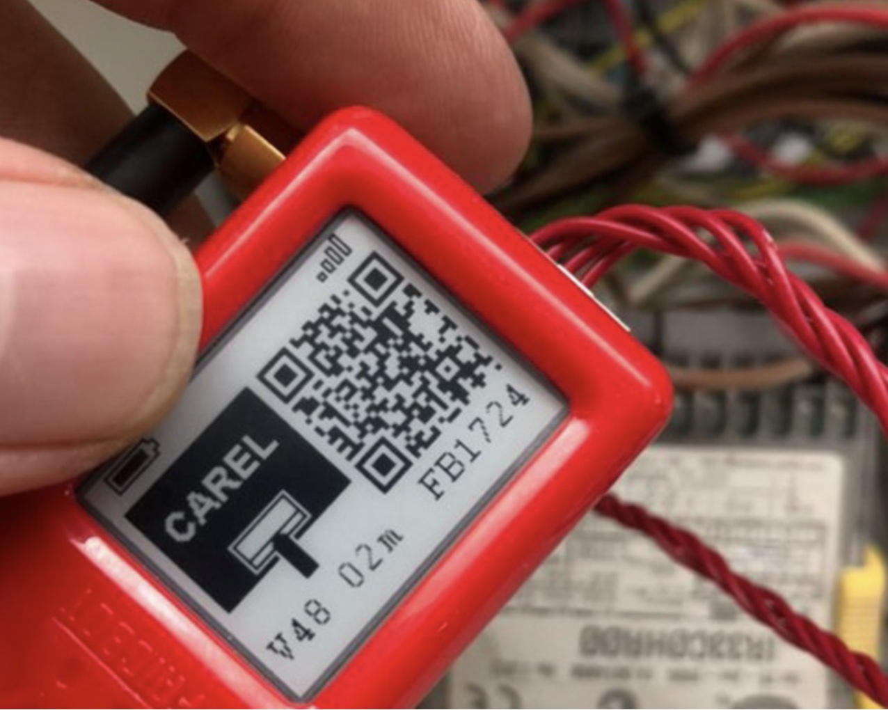 A Frigbot device showing a high-temperature alarm